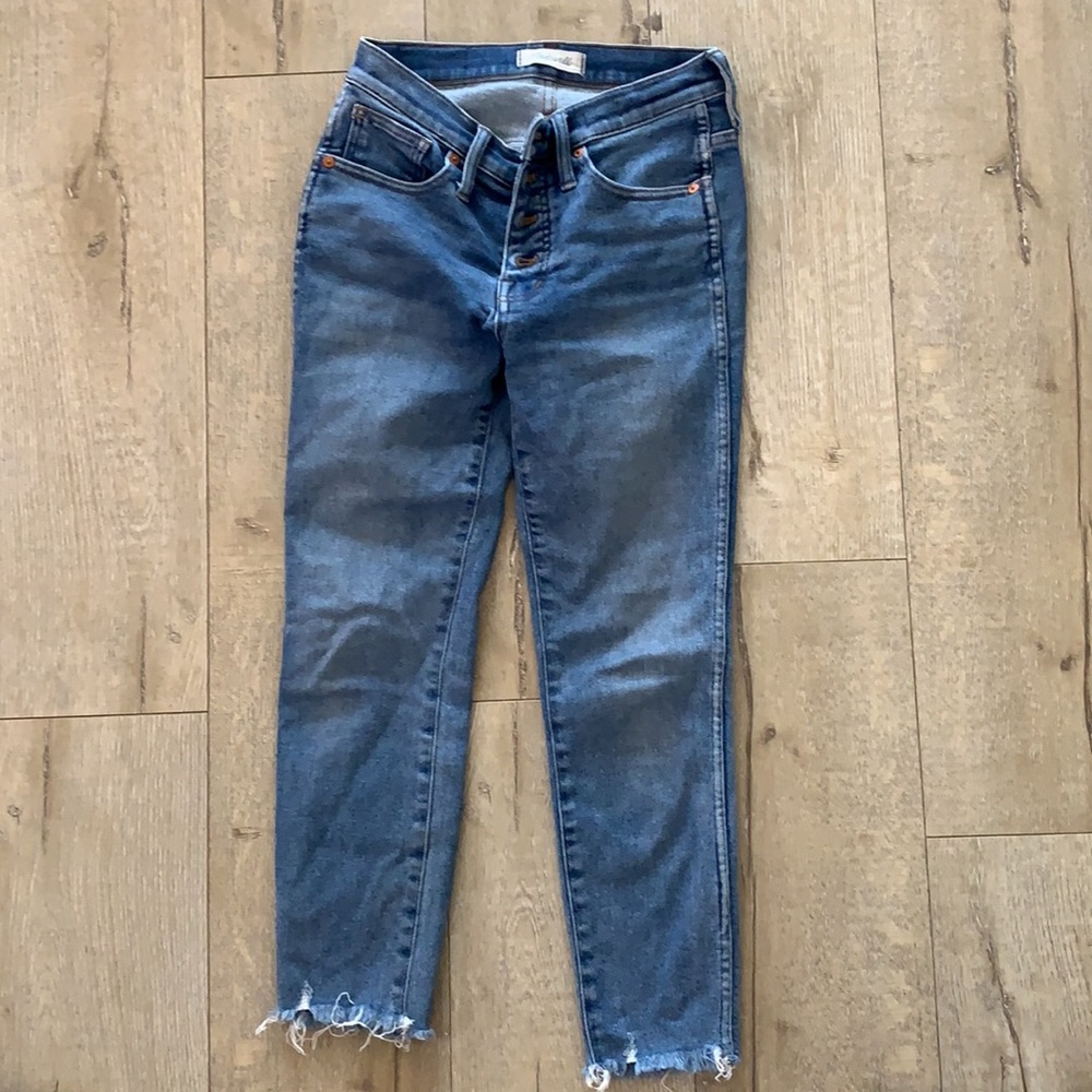 Madewell button-fly 10” high-rise skinny jeans.